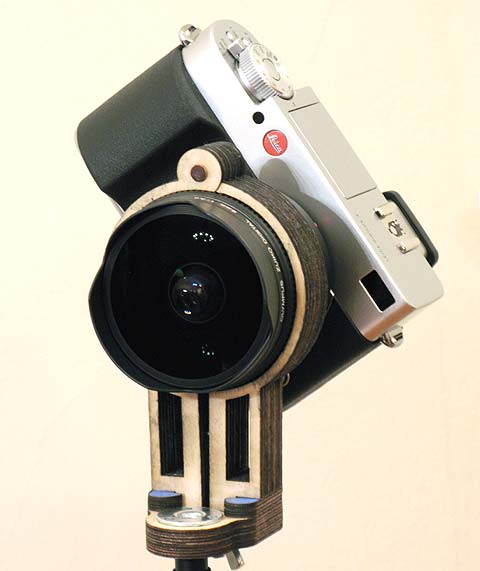 Leica Digilux 3 camera with Olympus8mm fullframe digital fisheye lens, mounted diagonally in a tbopod bracket for spherical panorama photography.